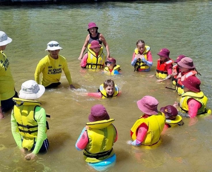 Students learning how to save themselves and others in open waters